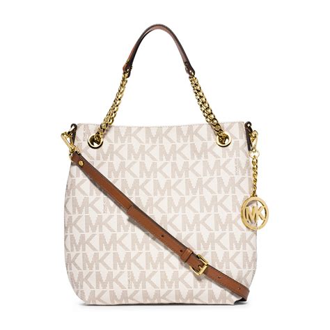 michael kors jet set medium tassel signature shoulder bag|Michael Kors woven handbags.